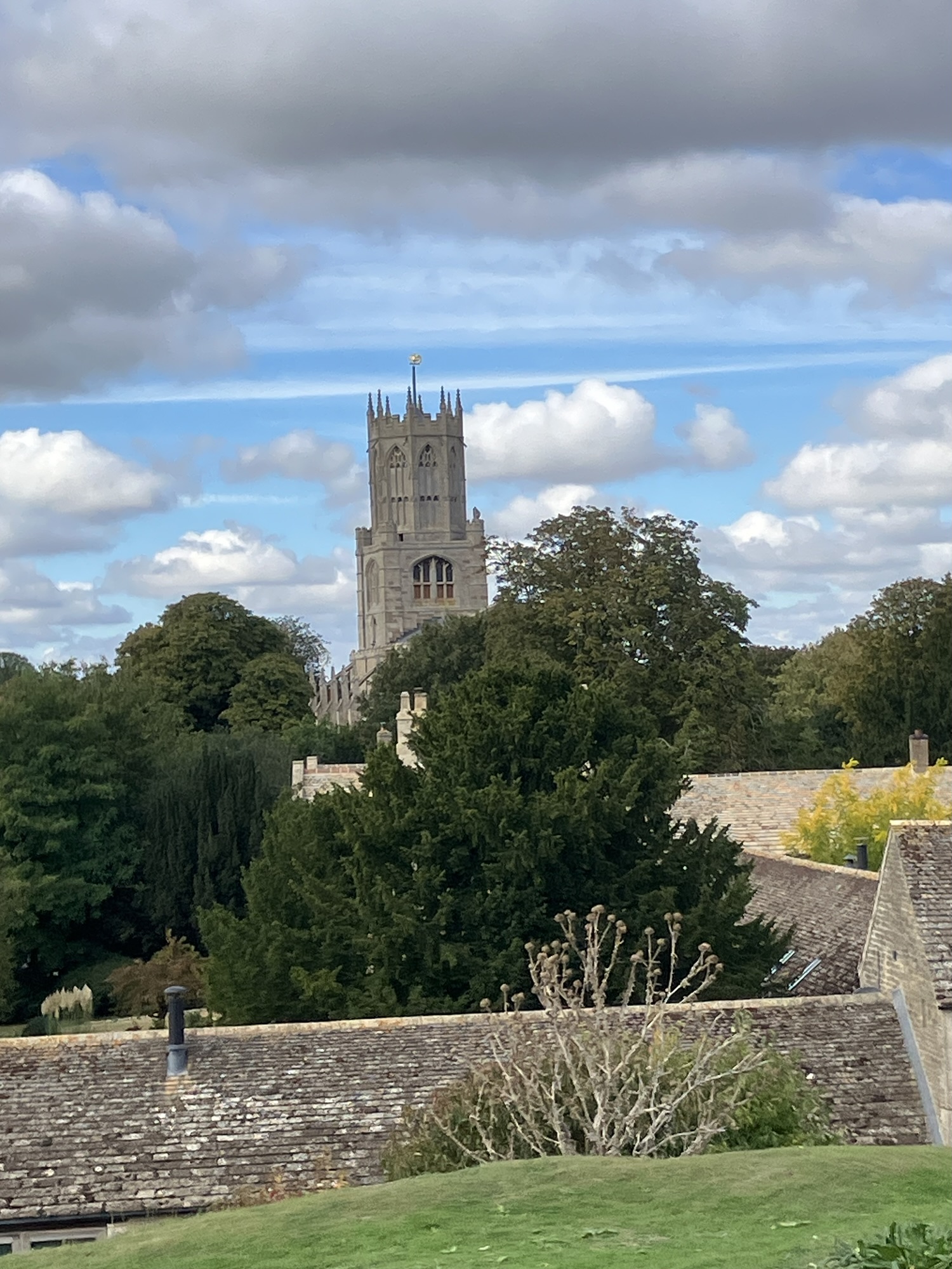 Fotheringhay church beneath a dramatic sky, photographed by Barry Aveyard